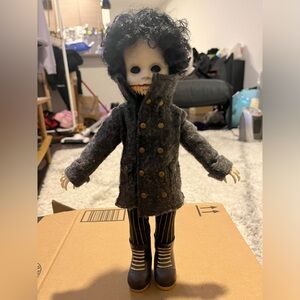Thump. Living Dead Doll w/ death certificate